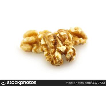 Walnuts towards white. Walnuts in a pile isolated towards white background