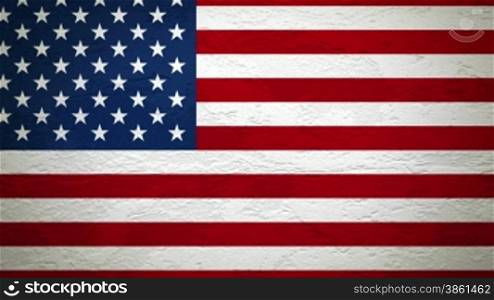 Wand mit Flagge der USA wird gesprengt, dahinter ist alles schwarz.