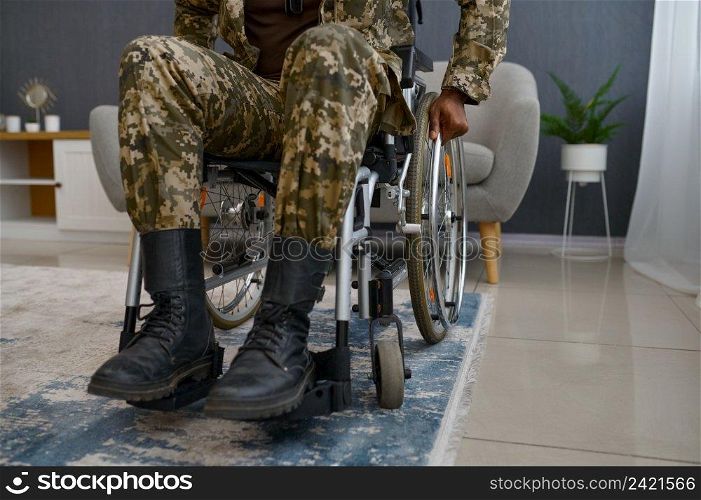 War veteran with disability sitting in wheelchair. Closeup view. War veteran with disability sitting in wheelchair