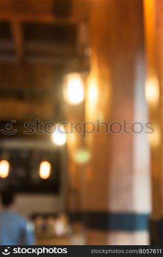 Warm lighting lamps on ceiling in coffee shop, stock photo
