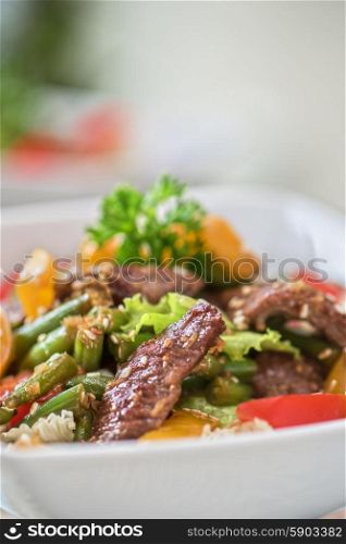 Warm salad with veal. Warm salad with veal closeup
