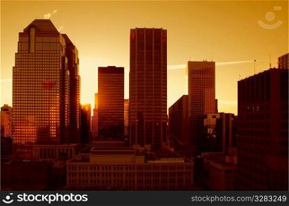 Warm sunset over Calgary&acute;s skyline.