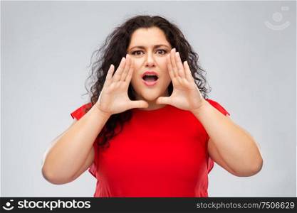 warning, communication and caution concept - worried woman in red dress calling over grey background. worried woman in red dress calling