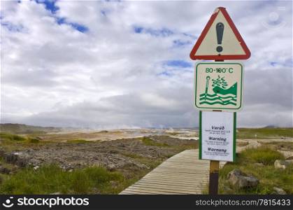 Warning sign for Geothermal activity and boiling water erupting from the earth in the Hveravellir Hot Spring area in Iceland