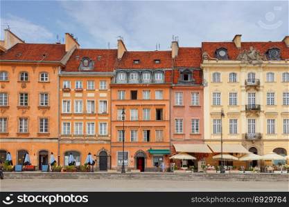 Warsaw. Old city.. Multi-colored facades of old houses in the historic center of Warsaw.