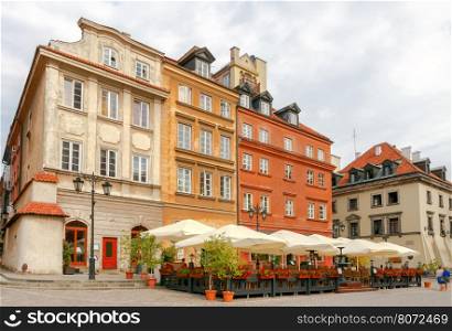 Warsaw. Old city.. Multi-colored facades of old houses in the historic center of Warsaw.