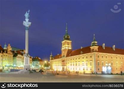 Warsaw. Old Town Square at night.. The Royal Castle and the Column of King Sigismund the Old City at night. Warsaw. Poland.