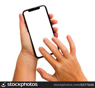 WARSAW, POLAND - DECEMBER 02, 2017: Two hands holding and touching new Iphone X mobile phone over white background. New Iphone X. New Iphone X