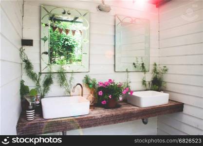 Washbasin with nature in home garden, White and beautiful concept