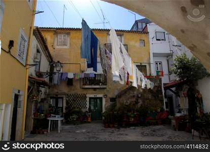 Washing hangs in courtyard, Lisbon, Portugal