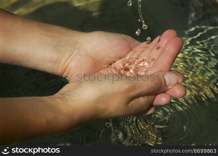 Washing Your Hands In A Natural Pool