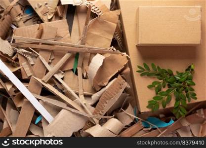 Waste paper and cardboard box background texture. Recycling concept and brown cardboard heap