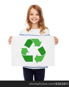 waste recycling, reuse, environment and ecology concept - happy girl with picture of green recycle symbol on paper over white background. girl with picture of green recycle symbol on paper
