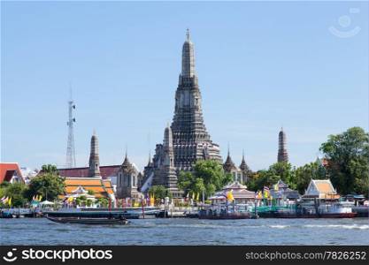 Wat Arun and river. Attractions of Thailand. The river front is the commute.