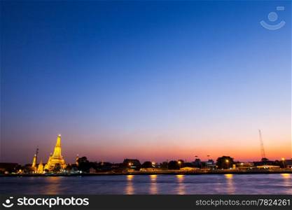 Wat Arun in the evening. Sun slowly disappear into the dark sky attractions of Thailand.