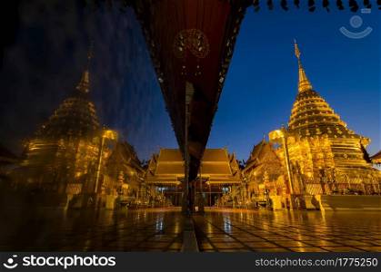 Wat phra that doi suthep temple in Chiang mai thailand, the most famous temple at twilight. Beautiful Pagoda with reflection.. Wat phra that doi suthep temple.