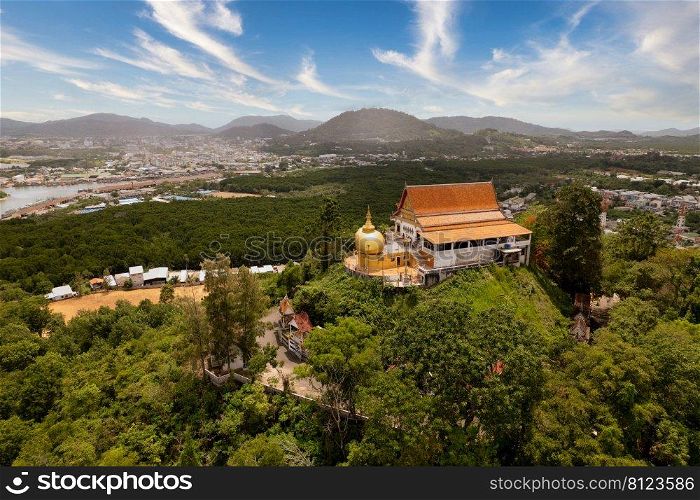 Wat Pra Tat Inkwan Phuket Thailand Kyaik-htiyo Koh Sirey, Phuket, Thailand - April 18, 2019  Terrace of Wat Koh Sirey with the golden stupa and the Andaman Sea