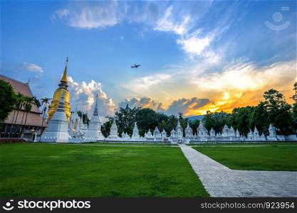 Wat Suan Dok is a Buddhist temple (Wat) at sunset sky is a major tourist attraction in Chiang Mai,Thailand.