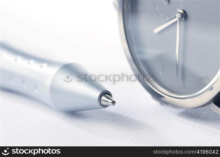 watch and pen closeup