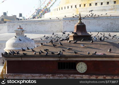 Watch on the temple near stupa Bodnath in Kathmandu, Nepal