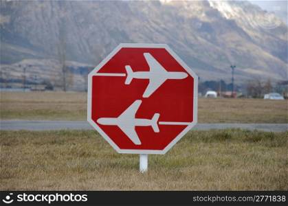 Watch out for planes at Queenstown International Airport, Otago, New Zealand