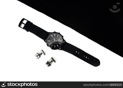 watches and cufflinks on the table. watches and cufflinks on the table, black and white