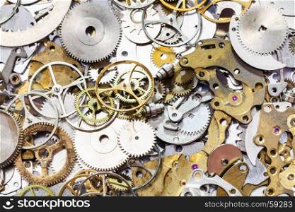 watchmaker workshop - many used watch spare parts close up