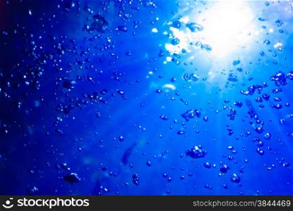 Water and air bubbles. blue underwater