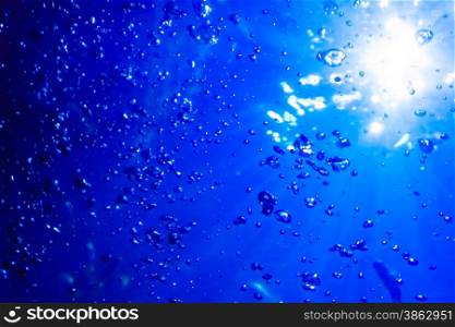 Water and air bubbles. blue underwater