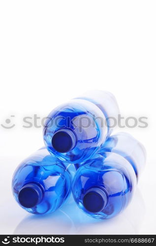 Water bottles on the white reflective background