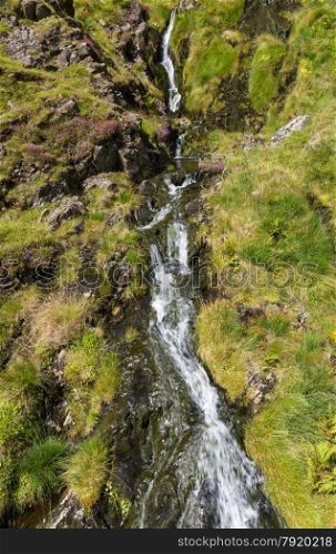 Water cascade in Cwm Croesor. Snowdonia National Park, Gwynedd, North Wales, United Kingdom. This is a slate mining area.