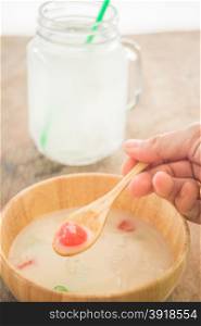 Water chestnut coated with tapioca starch in coconut cream, stock photo