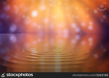 Water droplets on orange background