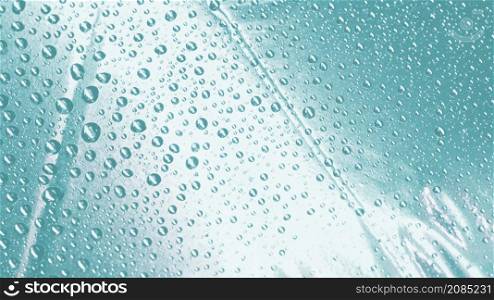 water droplets shiny turquoise surface backdrop