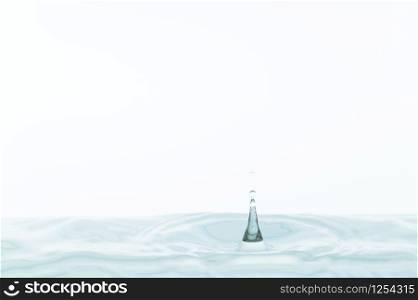 Water drops and water waves in a white background
