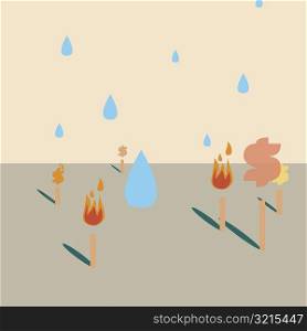 Water drops falling over flaming torches
