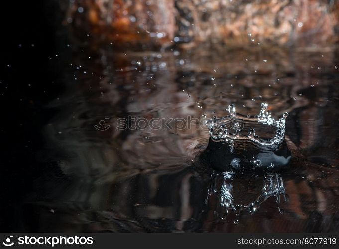 Water drops in nature environment. Wooden background
