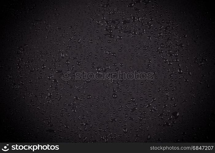Water drops on dark stone . Water drops on dark stone surface texture background