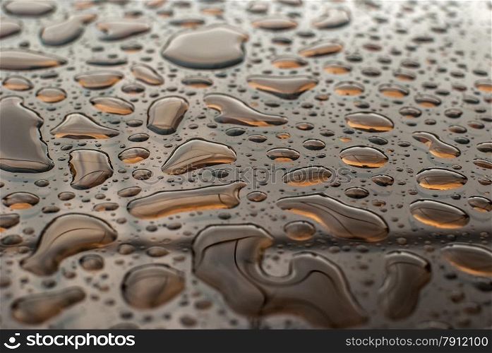 Water drops on glass surface as abstract background
