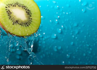 water drops on slice of kiwi