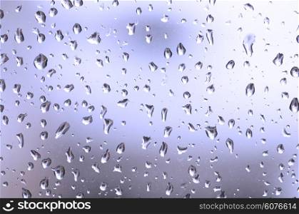 Water drops on the surface of glass
