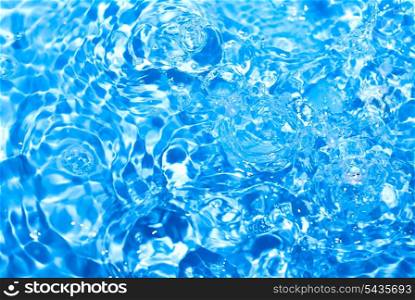 water drops over blue background with copy space