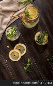 Water flavored with lemon, cucumber and rosemary leaves.