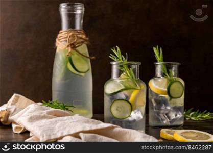 Water flavored with lemon, cucumber and rosemary leaves.