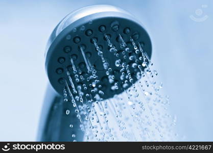 water flowing from metal shower