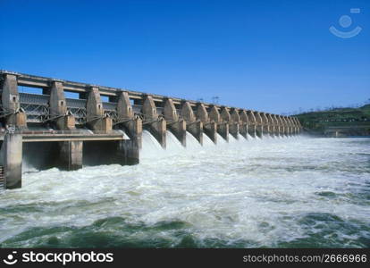 Water flowing through dam