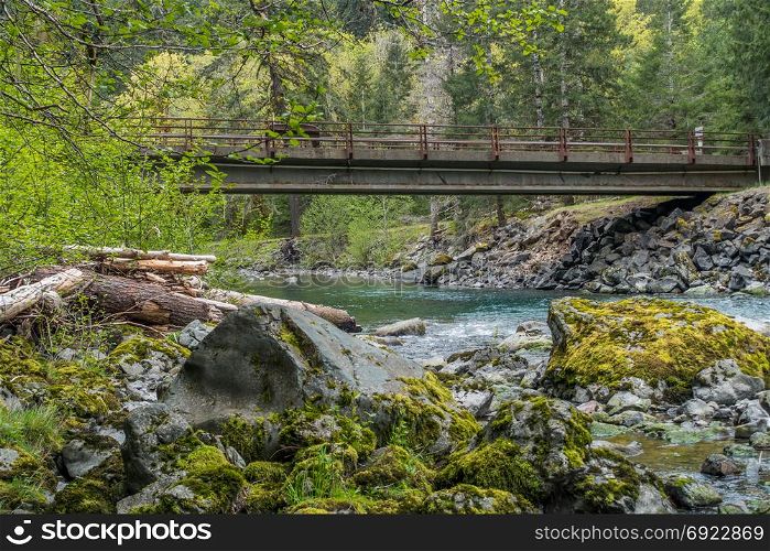 Water flows under a bridge at Staircase campground in Olympic National Park in Washington State.