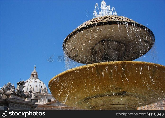 Water fountain in St. Peter&acute;s Square, Vatican City, Rome, Italy