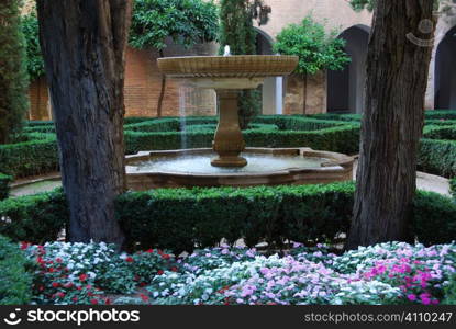 Water fountain in the gardens of the Alhambra, Granada, Andalusia, Spain