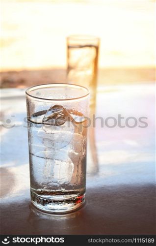 water glass with Ice on the tabel